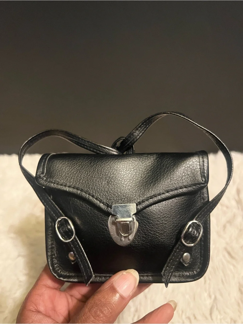 Three piece bundle of two coin, purses, and one small wallet
